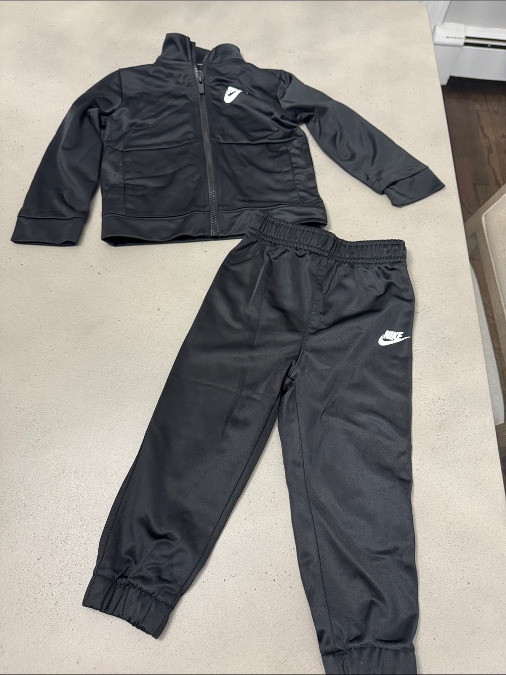 Nike Kids Black Track Jacket and Joggers Set with White Logo